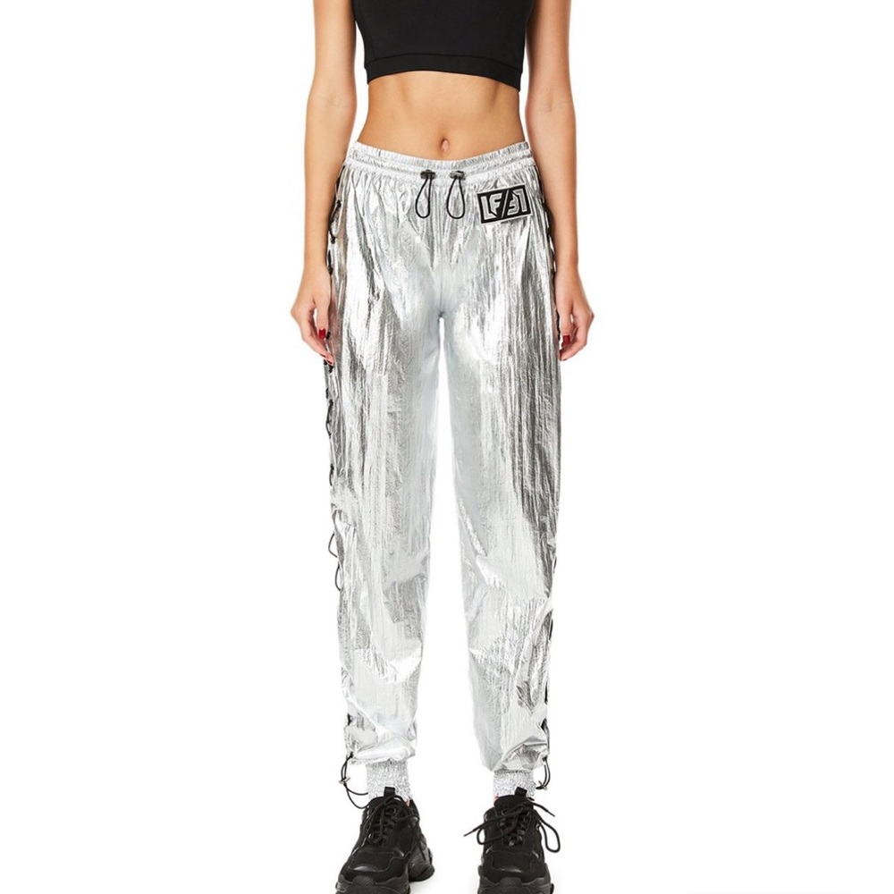 BRAND NEW lace up windbreaker pants in silver